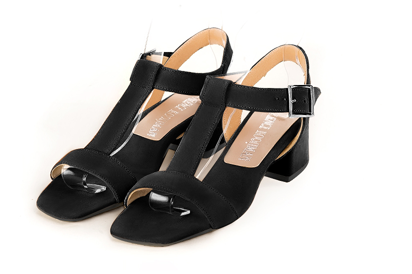 Matt black women's fully open sandals, with an instep strap. Square toe. Low flare heels. Front view - Florence KOOIJMAN